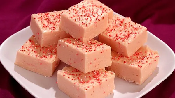 A plate of pink coconut fudge from the Barbie and Ken themed recipe.