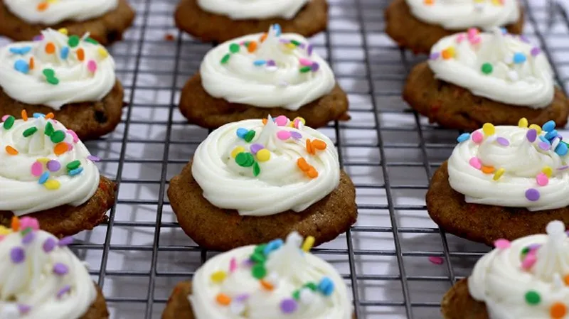 Soft carrot cake cookies topped with cream cheese frosting