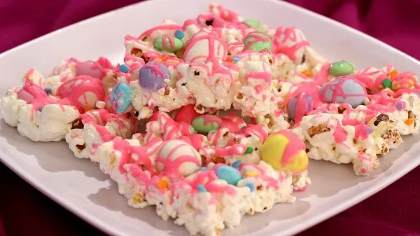 Plate of stacked, colorful Easter popcorn squares.