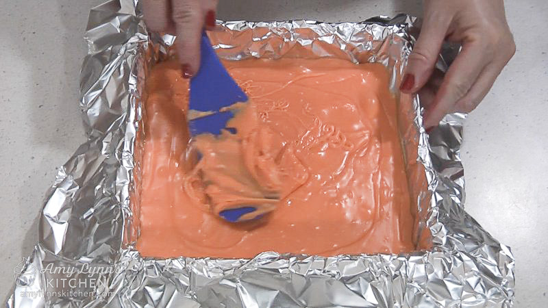 Pour the mixture into your prepared pan and spread it out evenly.