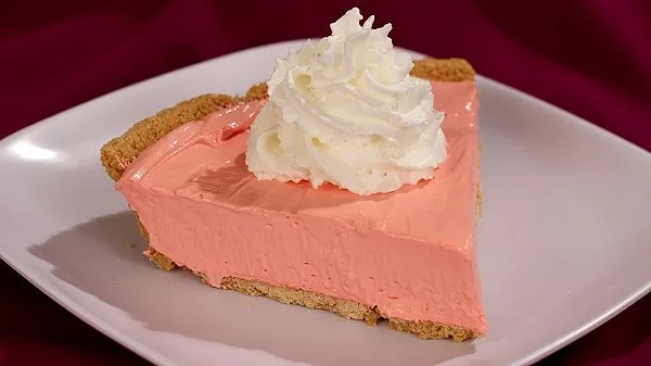 No-bake Kool-Aid pie with a fluffy whipped filling and graham cracker crust-bright, creamy, and bursting with nostalgic fruit flavor.