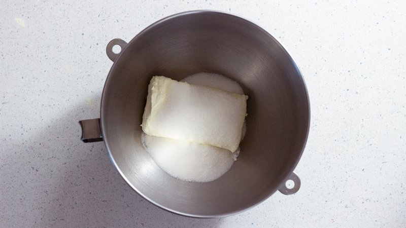 Add cream cheese and sugar to a mixing bowl.